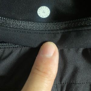 Lululemon 2.5 running shorts.  Size 4 in black